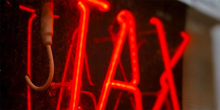 Tax neon light sign